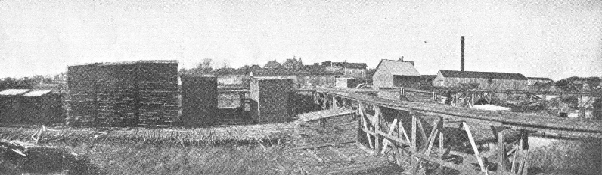 Stacked lumber at the Carthage Lumber Company in West Carthage
