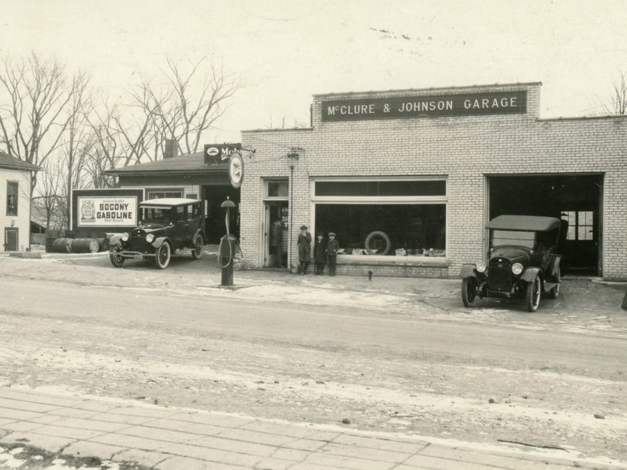Early taxis wait in front of the Crescent Garage Company in Ogdensburg