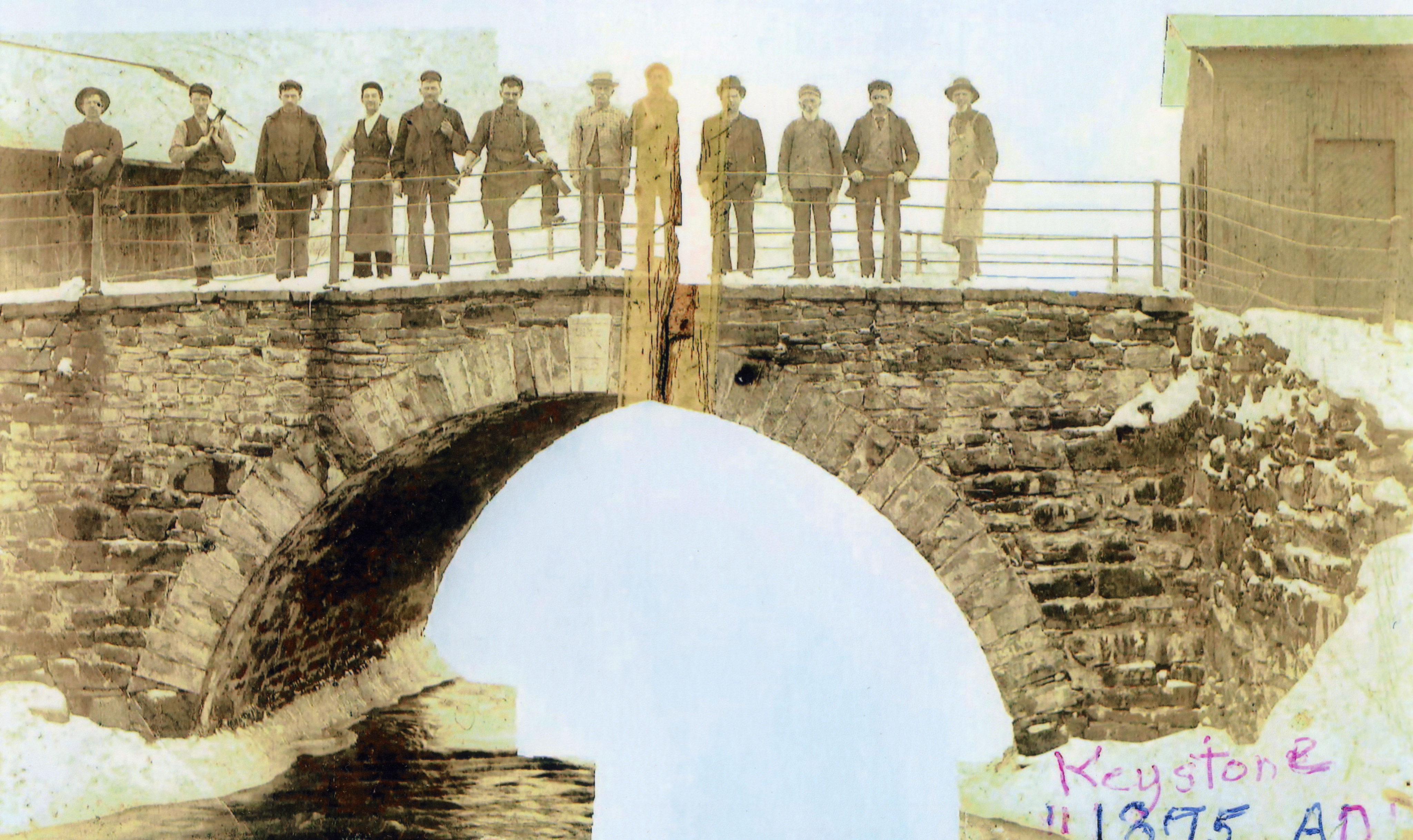 Builders on the recently finished McBrier bridge on Main Street in Hermon