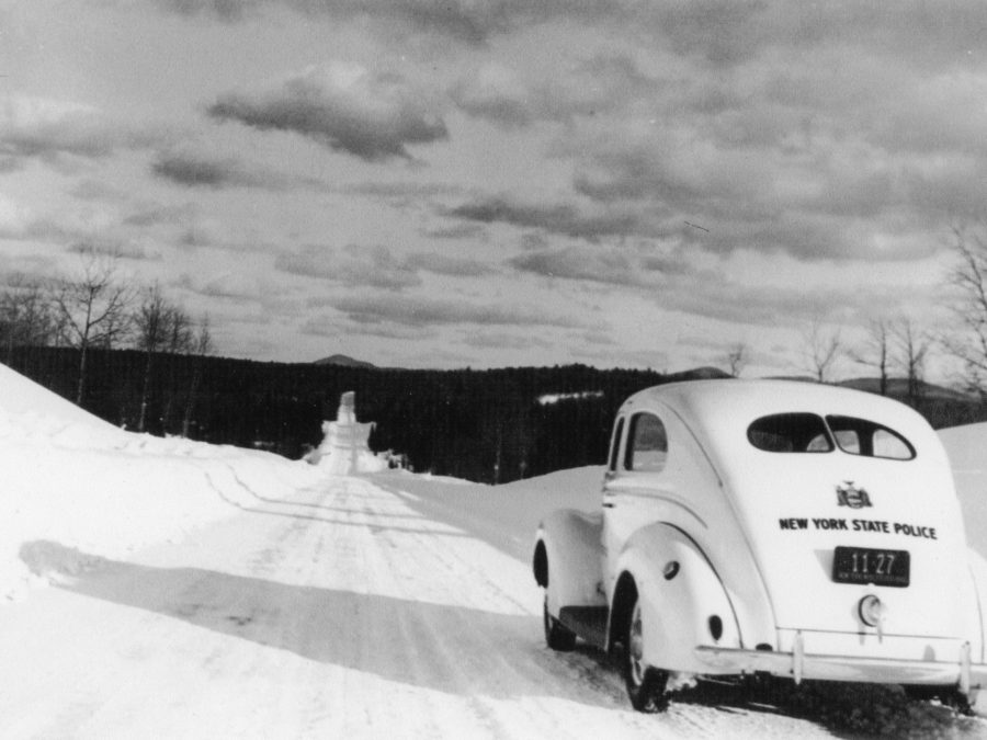 Officer Tom Proulx in a Tupper Lake Police Department vehicle in Tupper