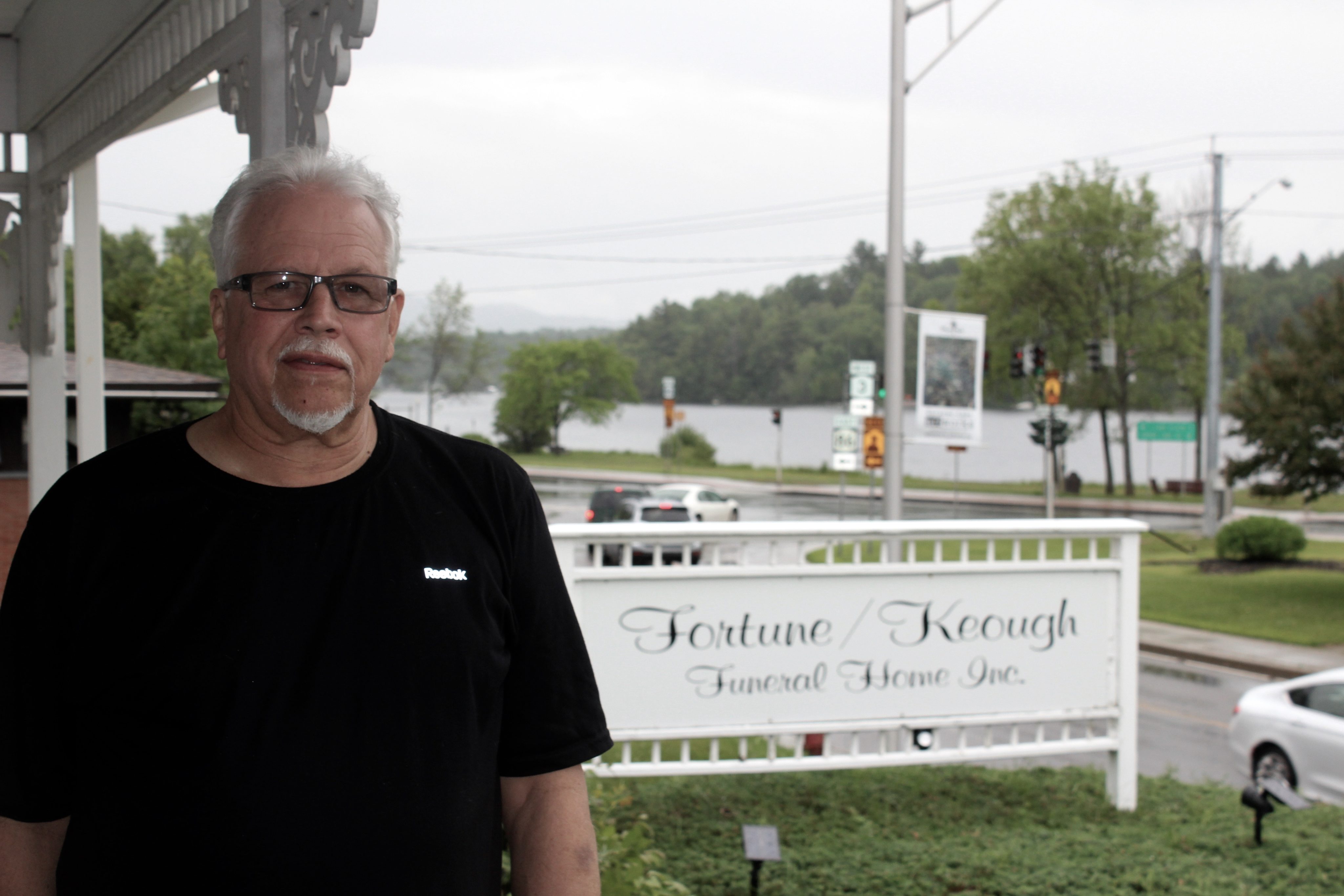 Andrew Fortune in front of the Fortune/Keough Funeral Home in Saranac