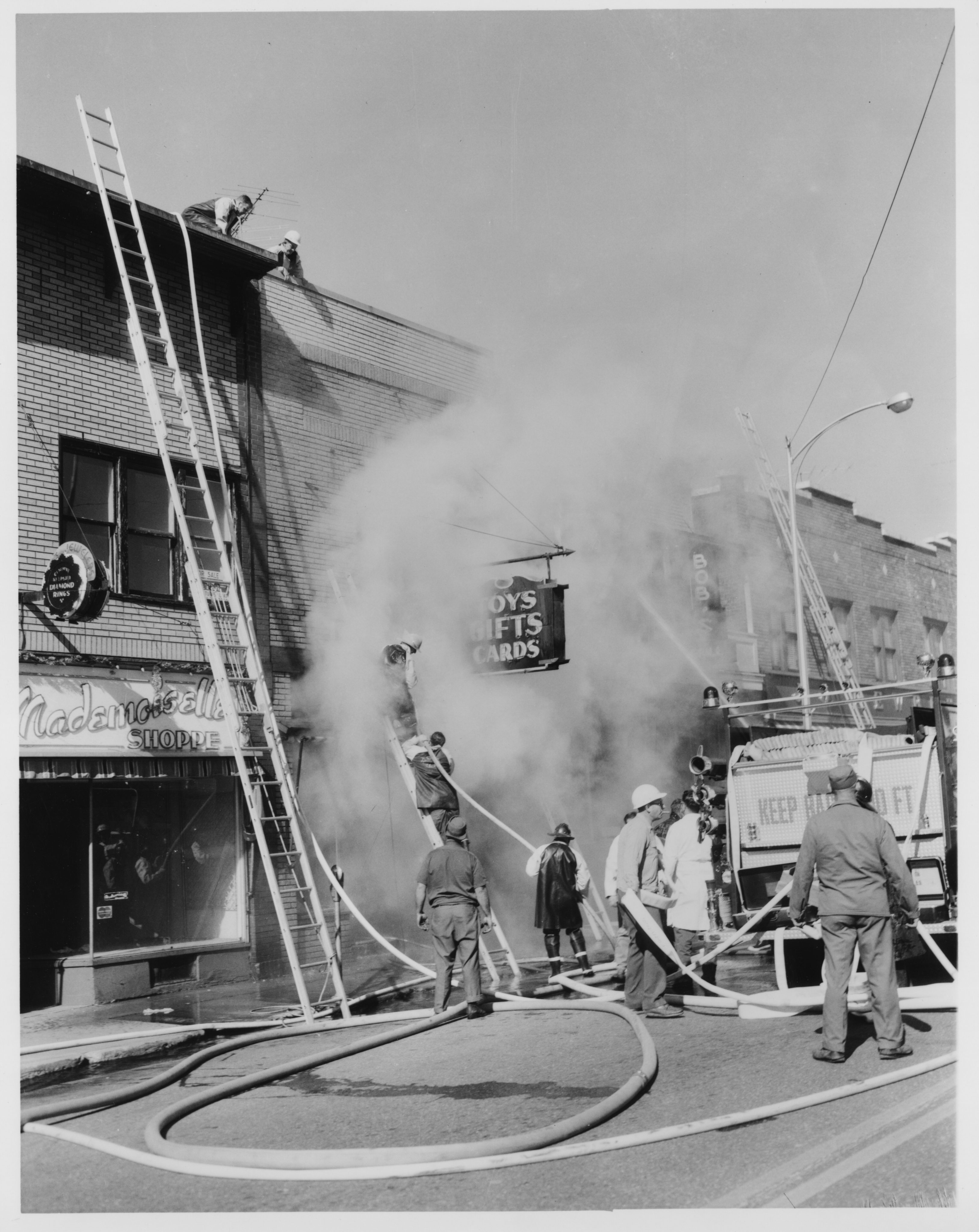 Putting out a fire at Clifford’s Gift Shop in Tupper Lake