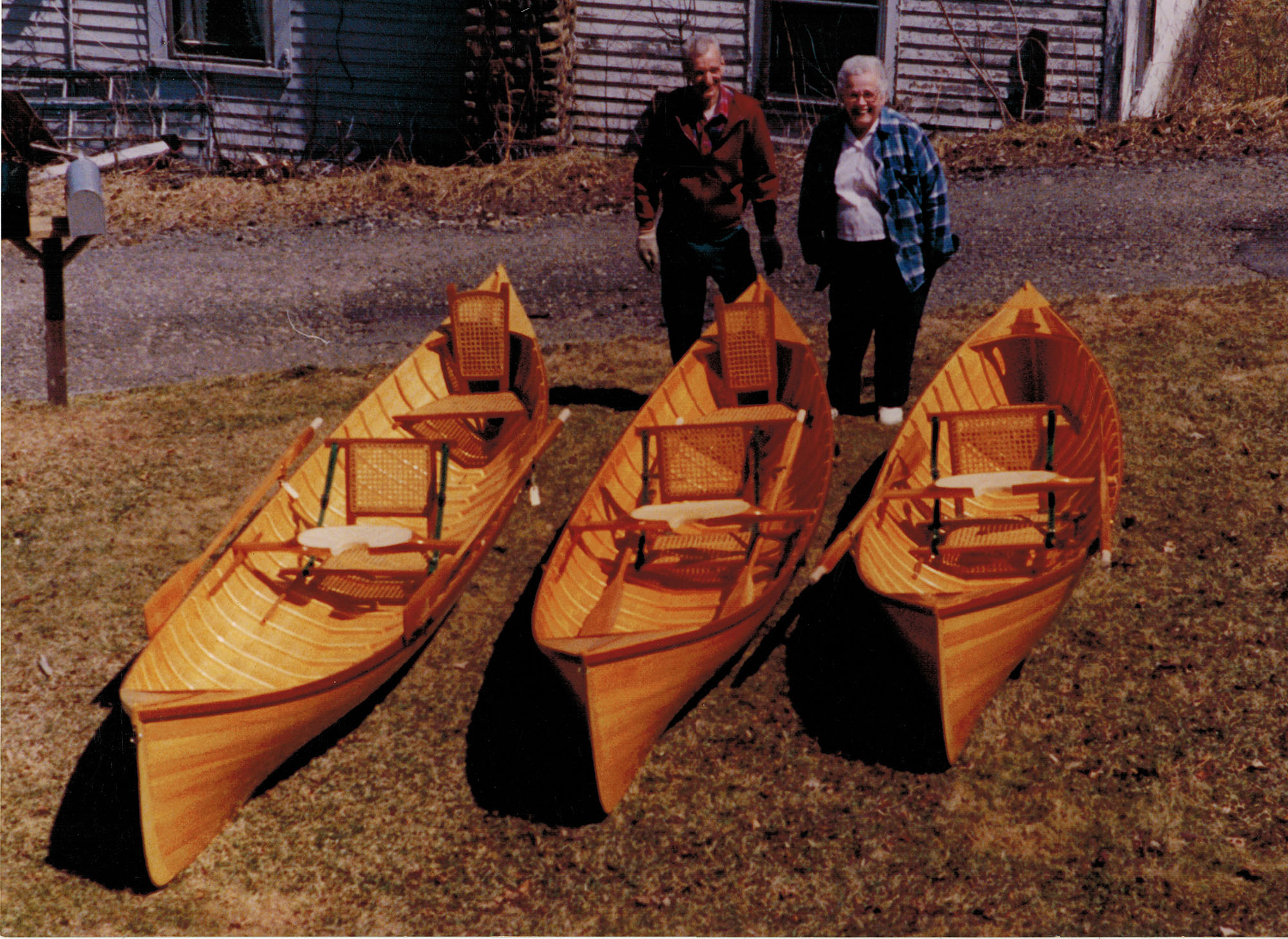 boat builder ralph morrow and his wife with his guide boats