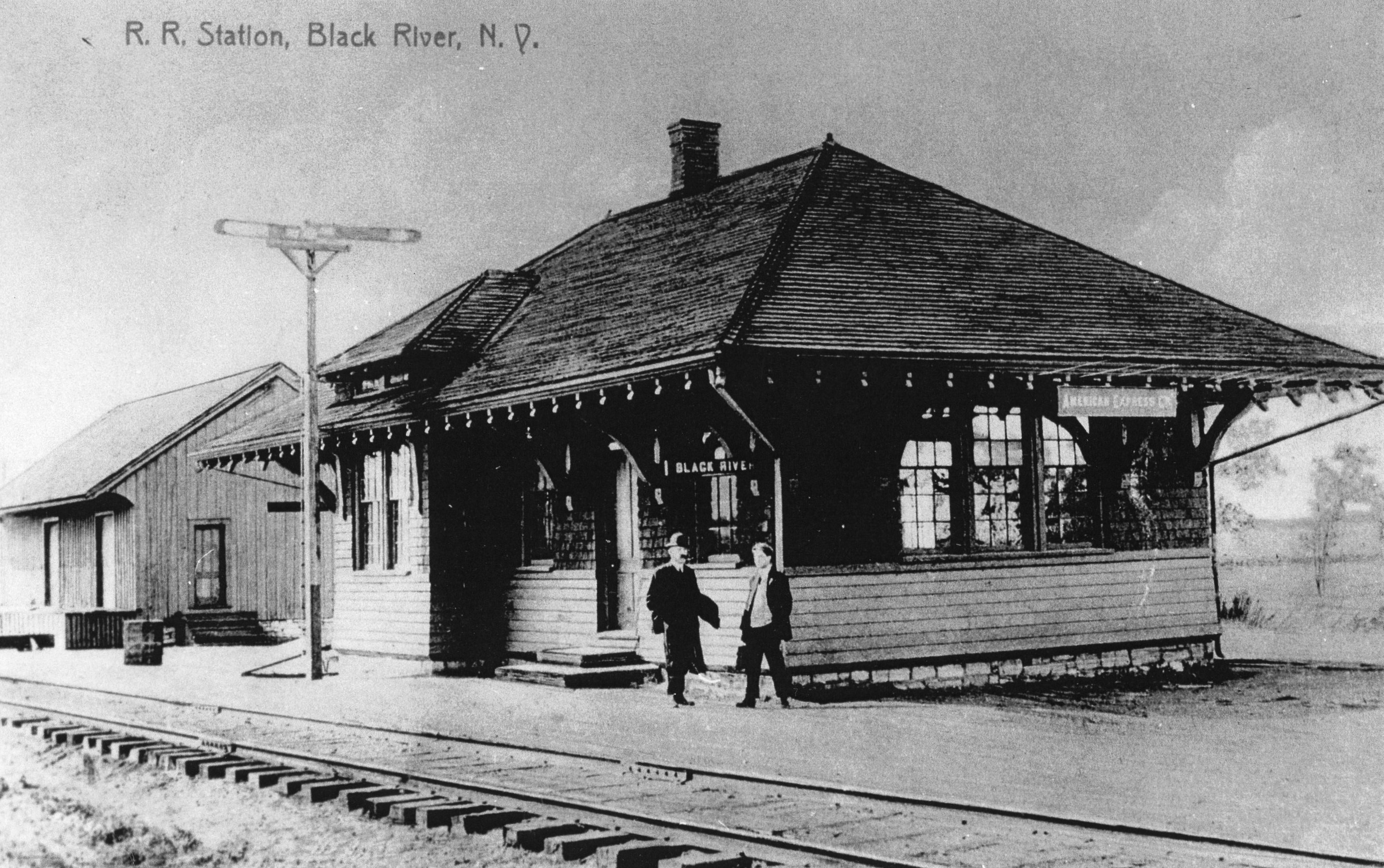 Adirondack & St. Lawrence Railroad train and employees in De Kalb