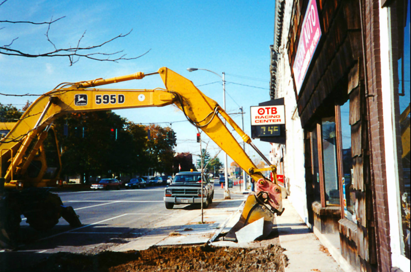 Removing sidewalk on Main Street in Gouverneur