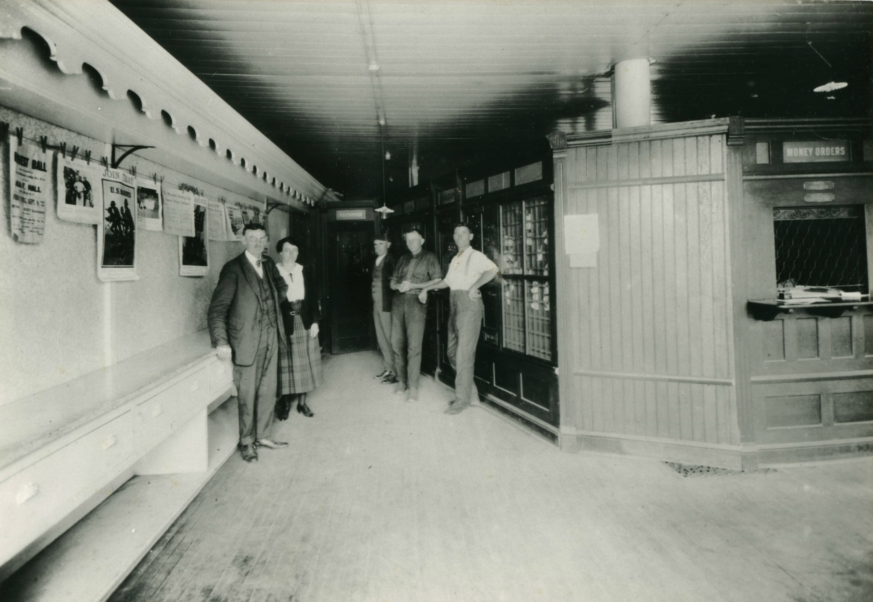 Employees in interior of post office in Hammond