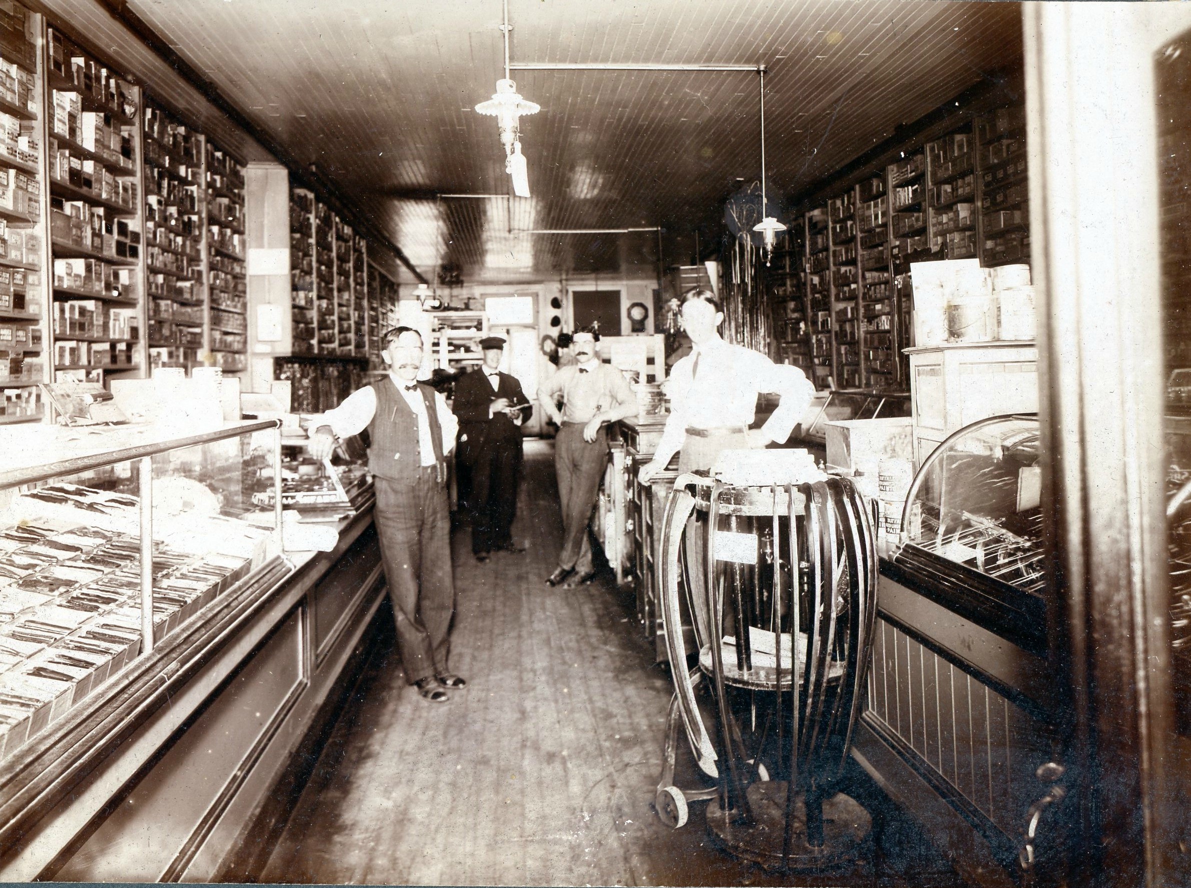 Employees inside hardware store in Watertown