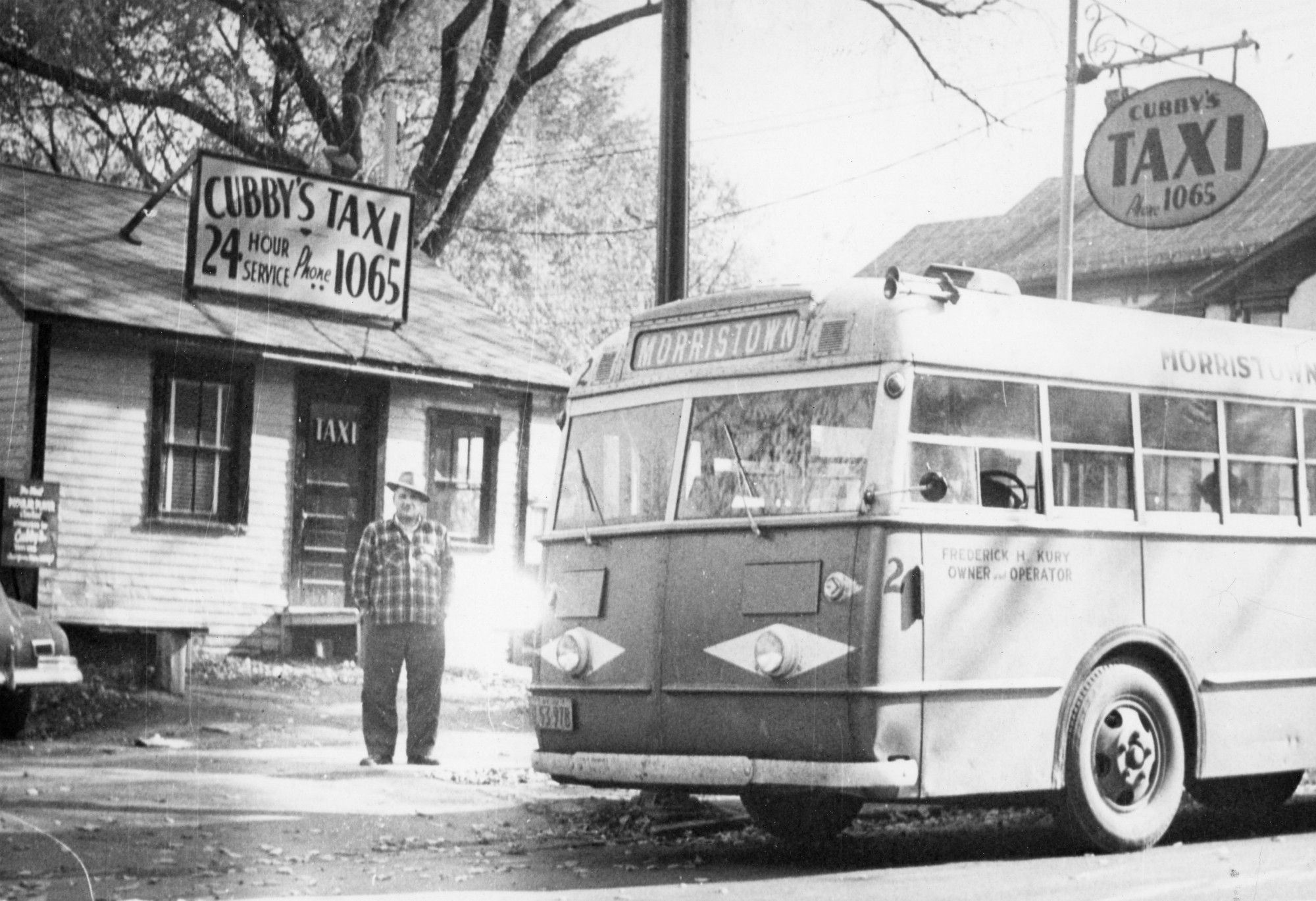 A bus in front of Cubby’s Taxi Stand and Bus Station in Ogdensburg