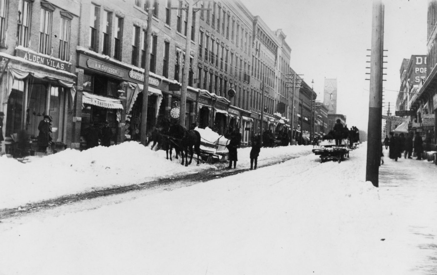 Snow removal with horses and wagons in downtown Ogdensburg