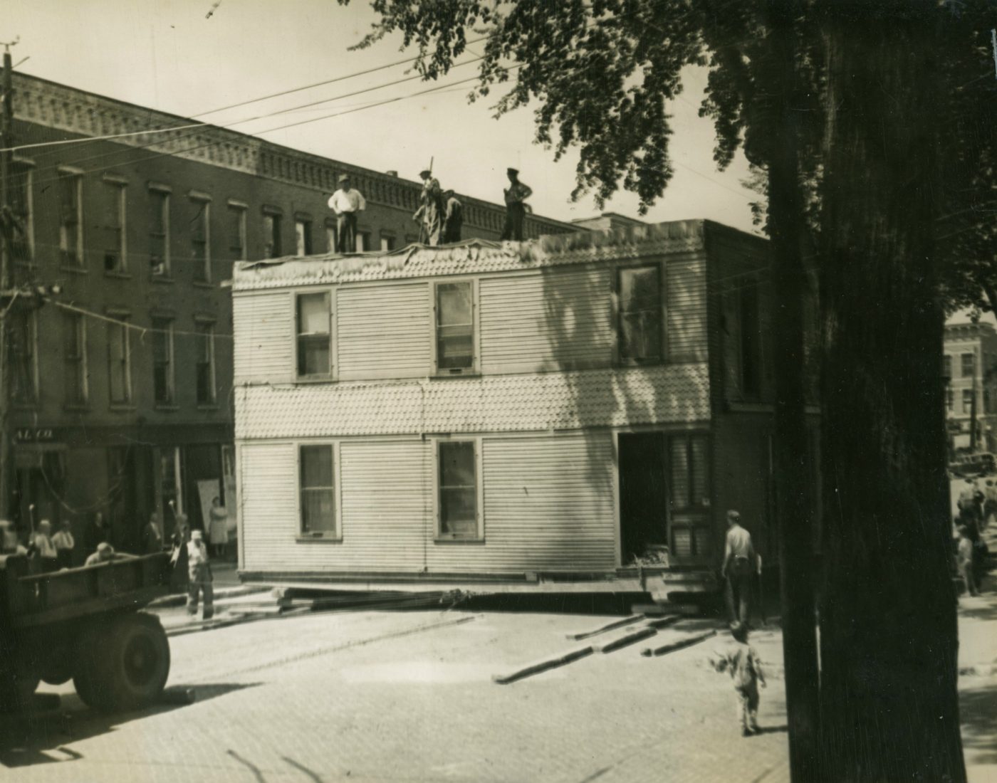 Moving a fourapartment house in downtown Ogdensburg