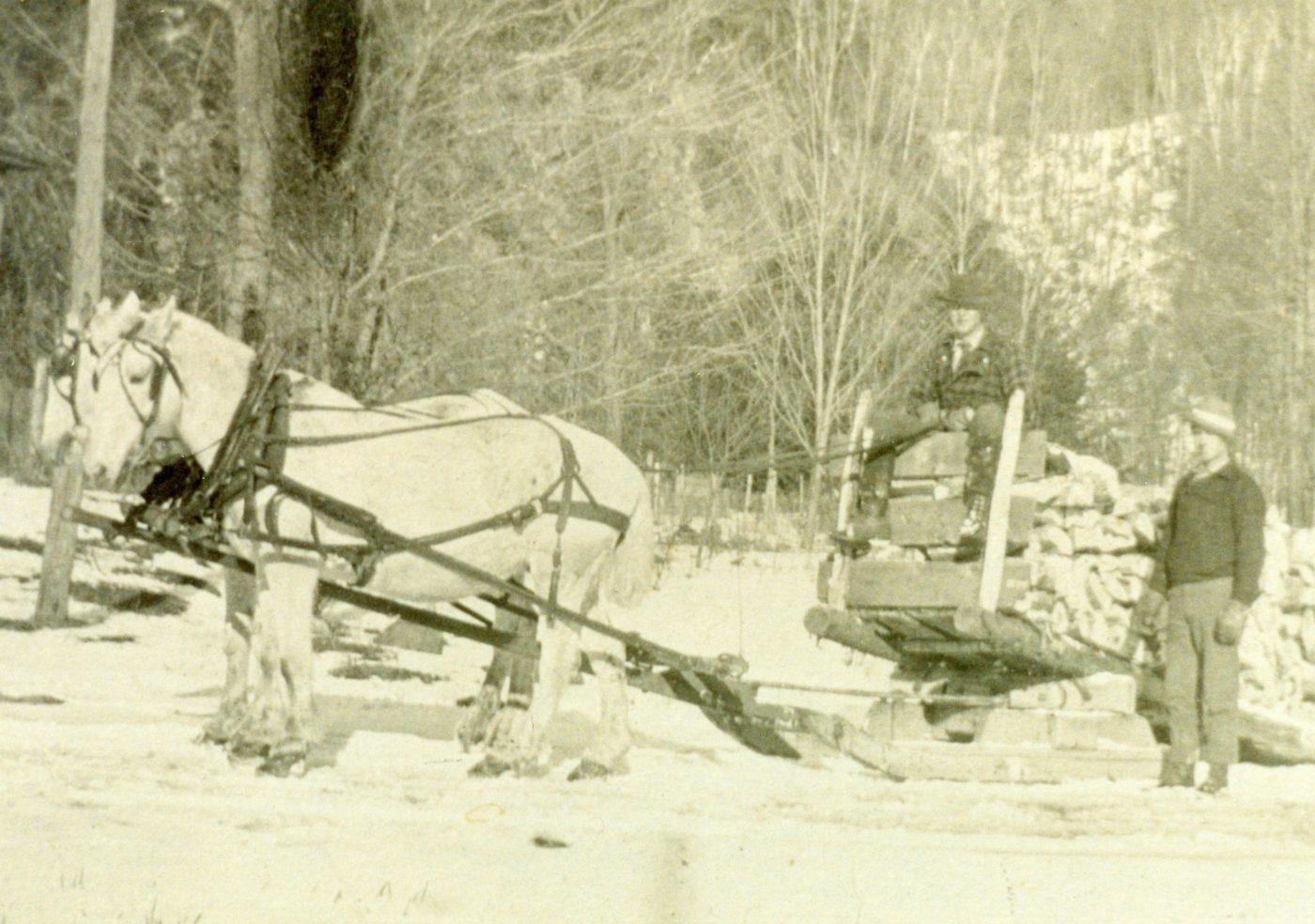 Winter bobsled load of firewood in Keene Valley