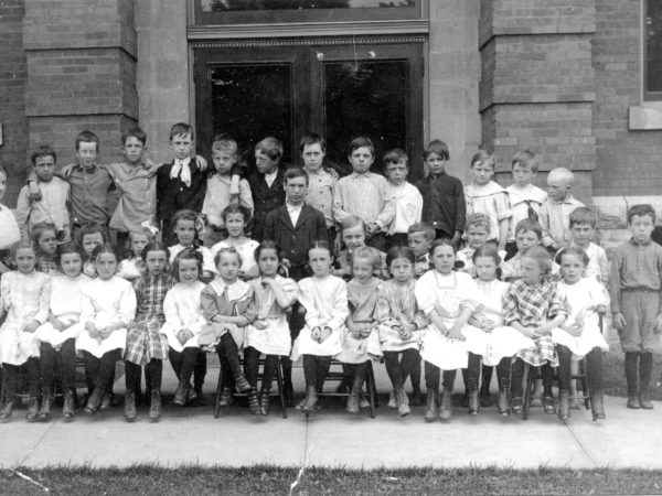 First Grade teacher and her class in Carthage