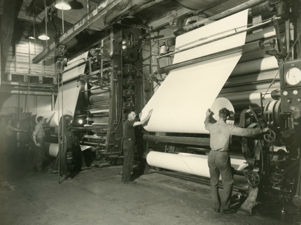 Working the calendar machines inside the Newton Falls Paper Mill in Newton Falls