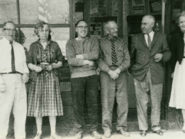 Lisbon Post Office employees pose in front of the post office. Pictured left to right: Art Harper, Doris Putney, Tom Driscoll, Ralph Scott, Earl Jones (Post Master), and Buleah Kelly. Earl Jones was Post Master from October 31, 1955 to July 16, 1958. Photo circa late 1950s (55-58). Lisbon, NY. Original photo loaned by current Post Master Michael Legacy on August 1997.