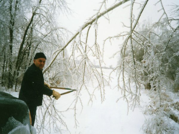 S. W. Green trims branches during the 1998 ice storm in Lisbon