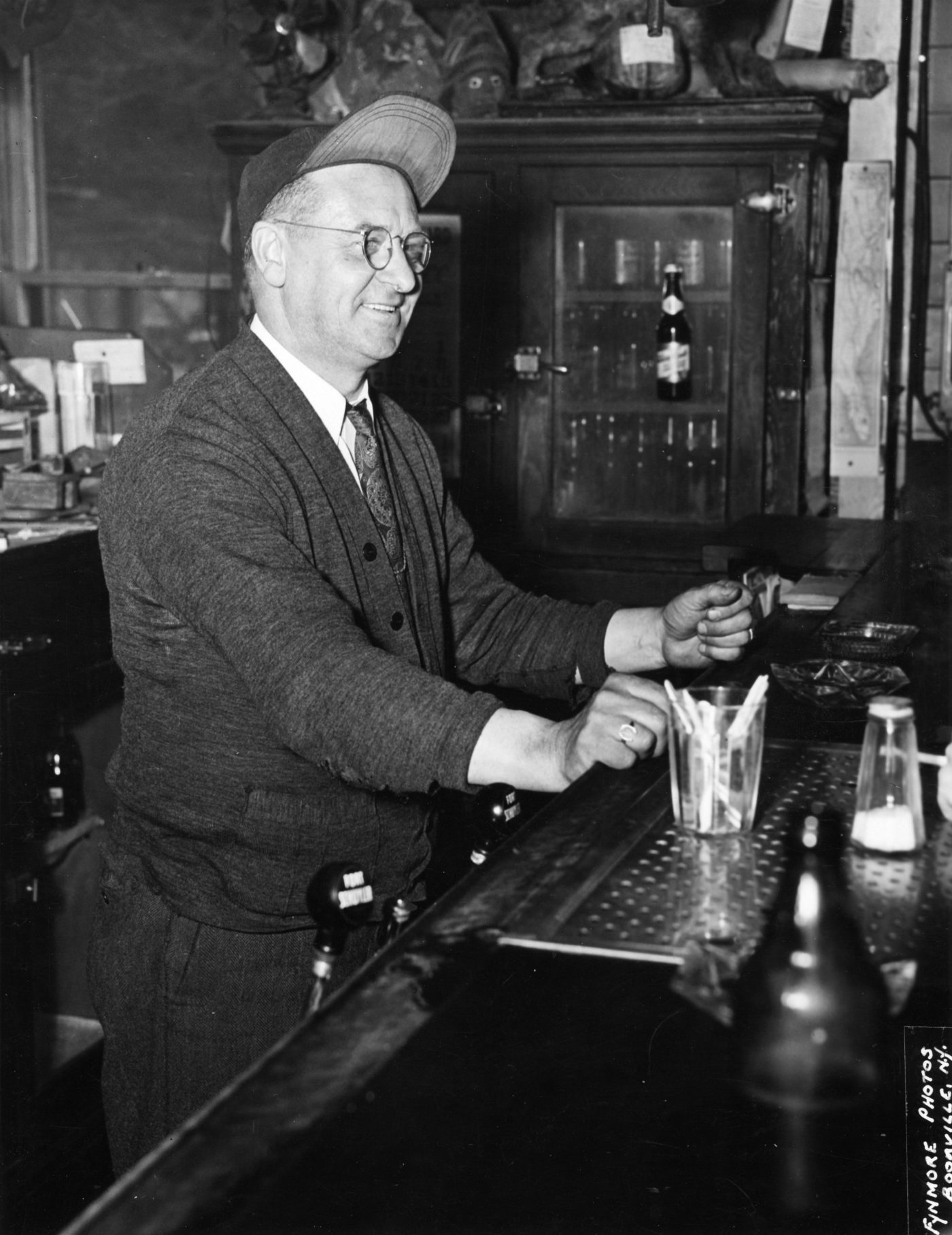 Frank Teich tending bar at the Trading Post in Eagle Bay