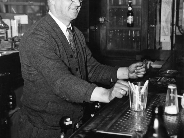 Frank Teich tending bar at the Trading Post in Eagle Bay