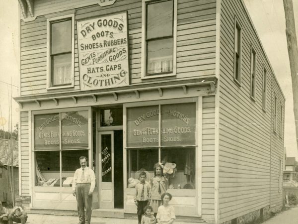 Berkowitz family outside their dry goods store in Old Forge