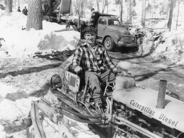 Willie Hall driving Caterpillar D4 Bulldozer in the Town of Webb