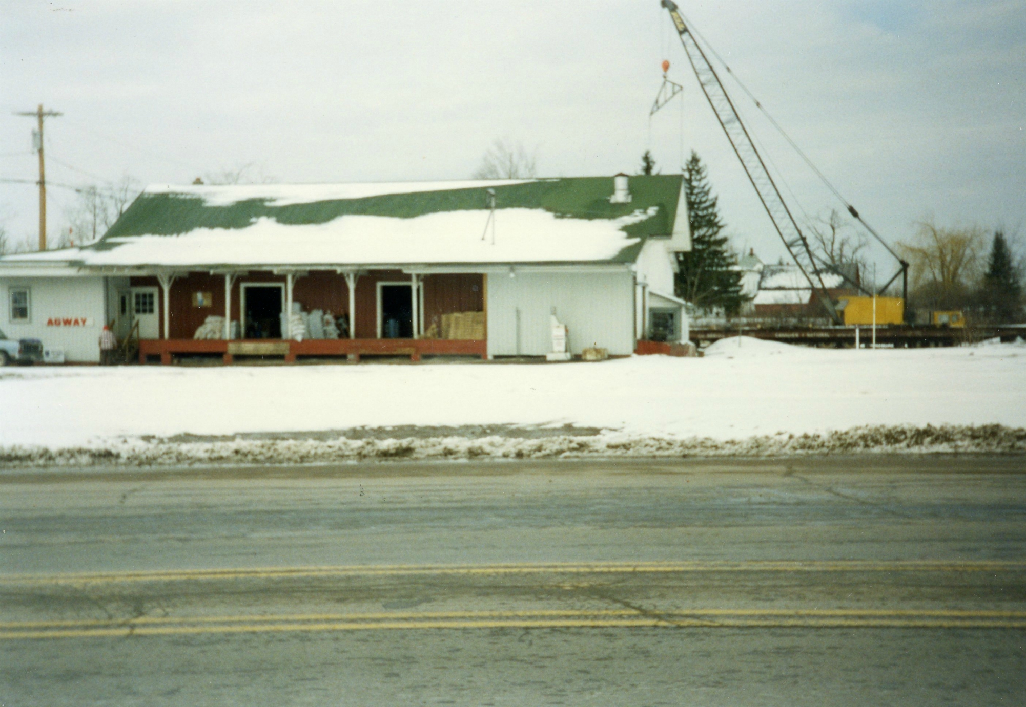 Agway store and railroad crane unloading in De Kalb Junction