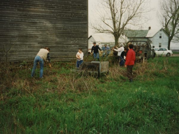 Community members work to restore the old meeting house in East De Kalb