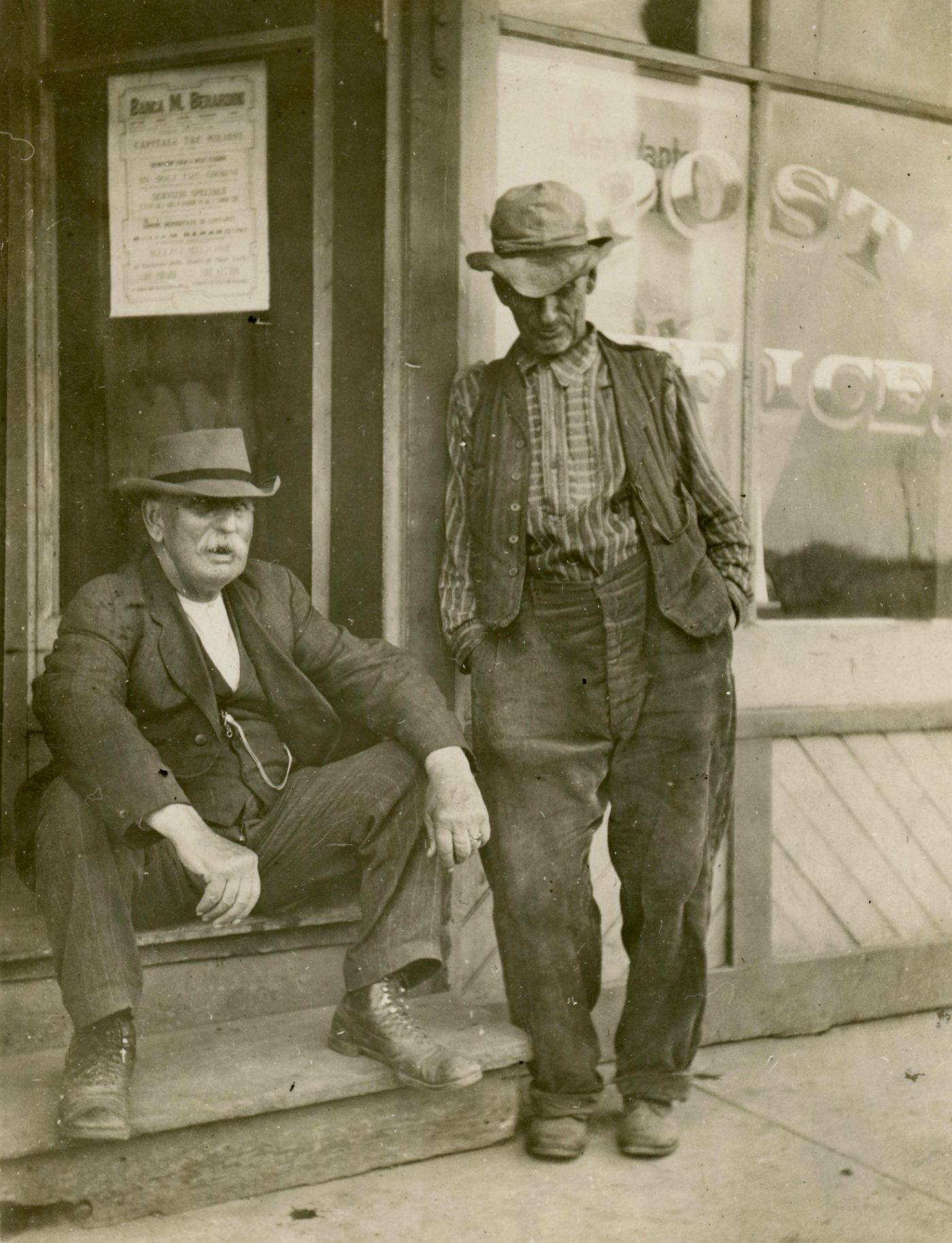 Conversation on steps of the post office in De Kalb Junction