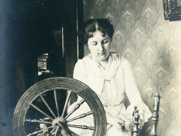 Woman spinning in the Town of De Kalb