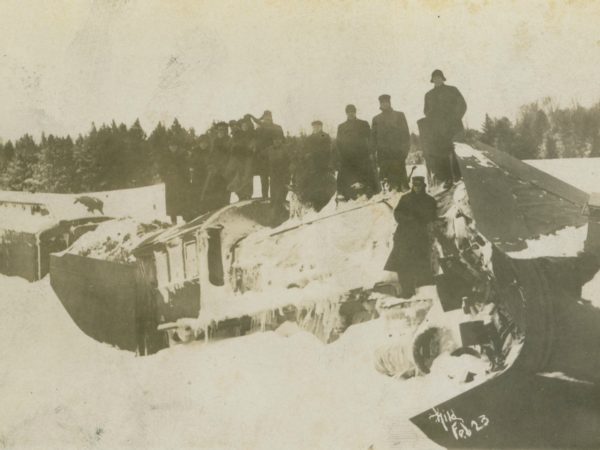 A collision between a passenger train and a snow plow in De Kalb Junction