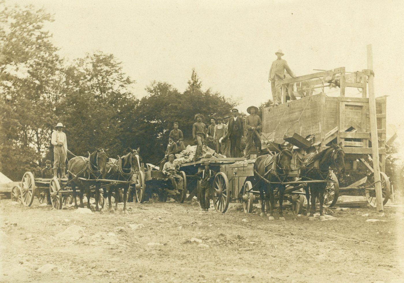 Road crew crushing stone in the Town of De Kalb