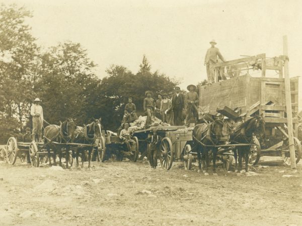 Road crew crushing stone in the Town of De Kalb