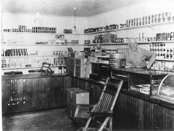 William Little John in his grocery store in South Colton