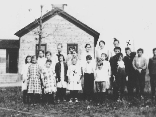 Children outside the Scott Bridge School in Fine