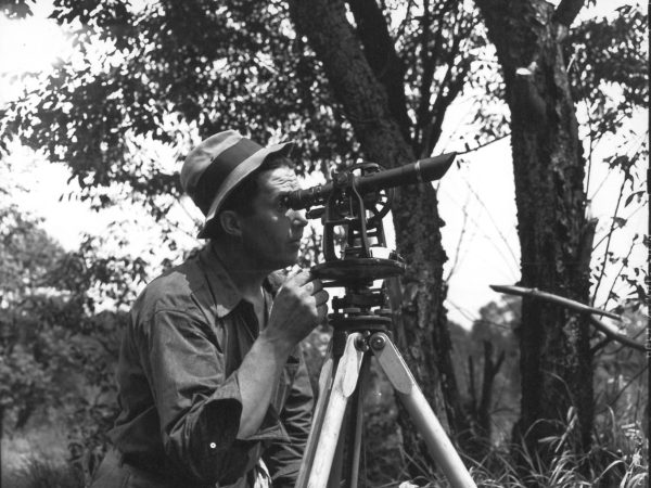 Surveying land with a theodolite in DeGrasse