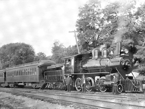 Railroad employees with #1673 Oswegatchie Railroad locomotive in Gouverneur