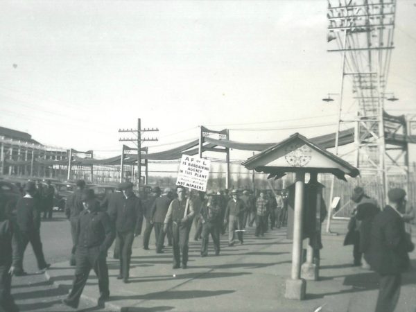 Men march in the ALCOA labor strike in Massena