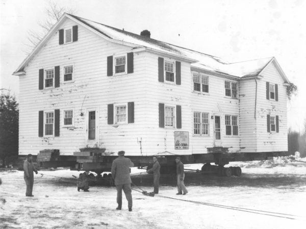 Moving a house in Waddington during the construction of the St. Lawrence Seaway