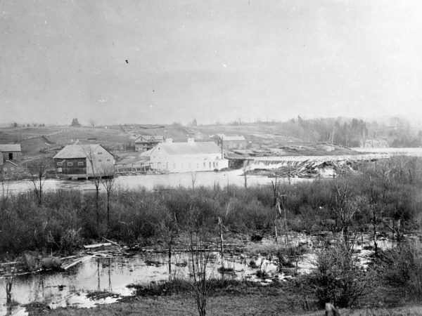 Log drive over the dam in Fullerville