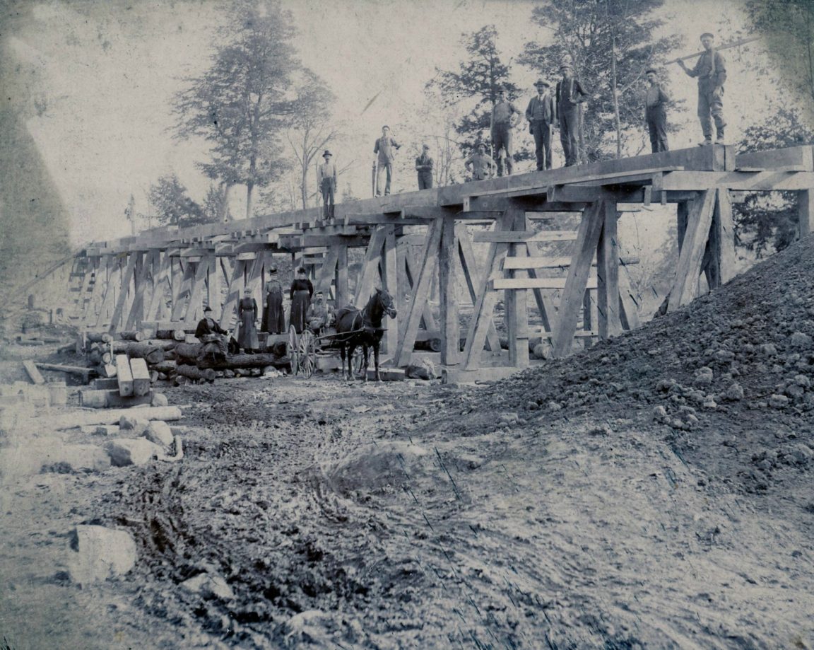 Construction of a trestle bridge in the town of De Kalb