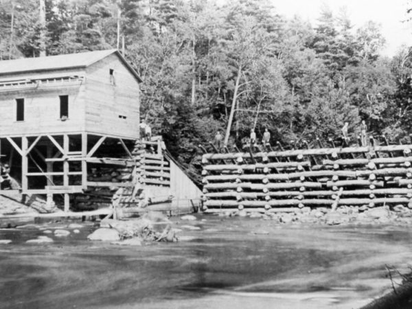 Chambers men building a dam on the St. Regis River in Lawrence