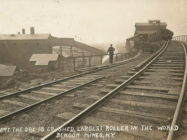 Railroad tracks and ore crusher in Benson Mines