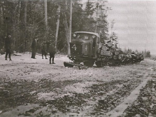 Emporium Forestry Company moving truckload of logs in Cranberry Lake