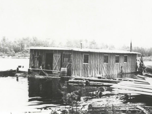 Floating lumber camp at Chair Rock Bay in Cranberry Lake