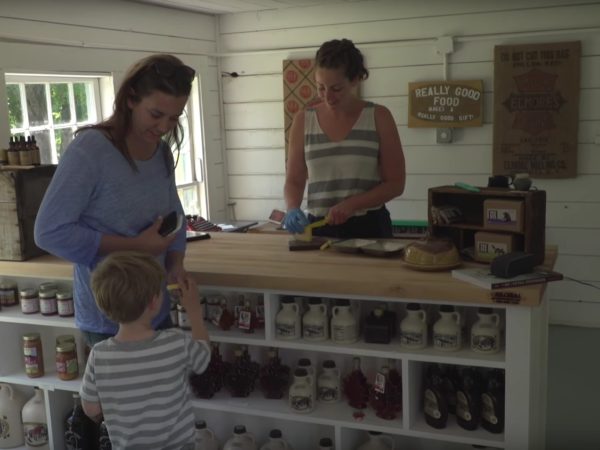 Tasting cheese in the farm store of Sugar House Creamery in Upper Jay