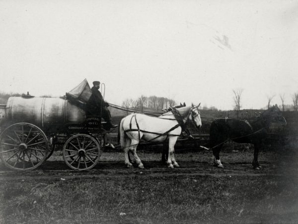 Horse drawn oil delivery wagon in Hermon