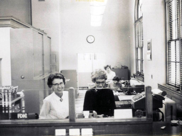 Tellers at work in the Essex County National Bank in Willsboro