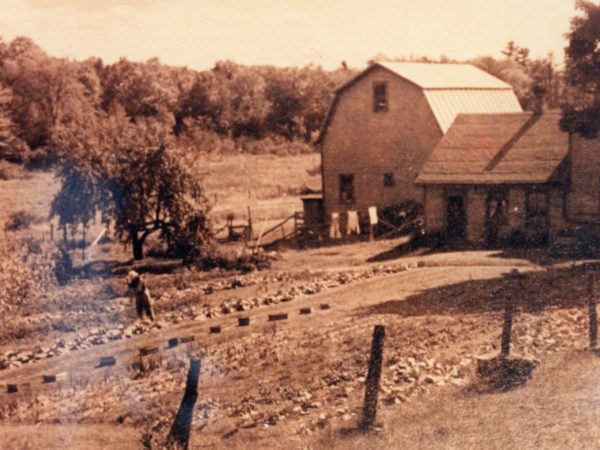 Farmer Warren Dake on the Dake Homestead in Oak Point