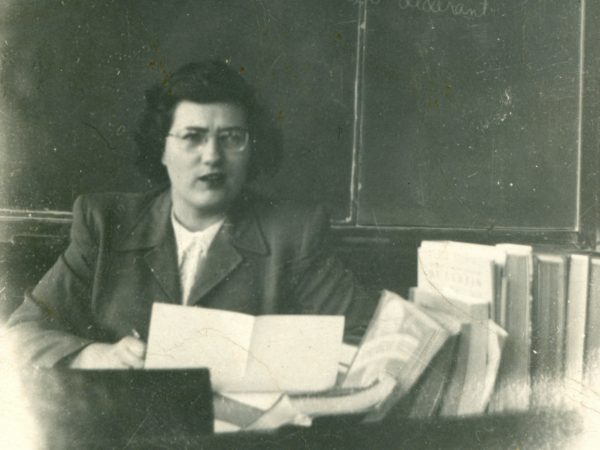 Teacher Doris Erdman at her desk in Hammond