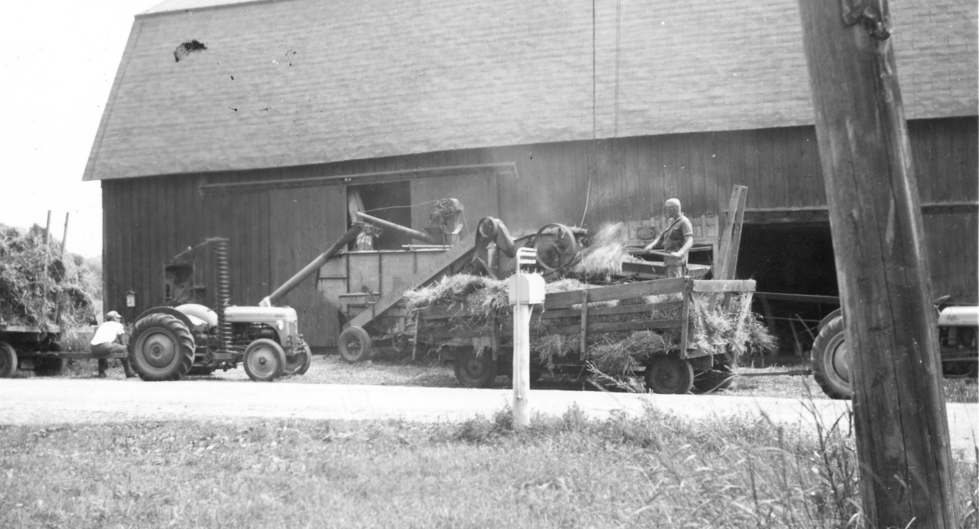 Threshing oats on the McGregor Farm in Hammond