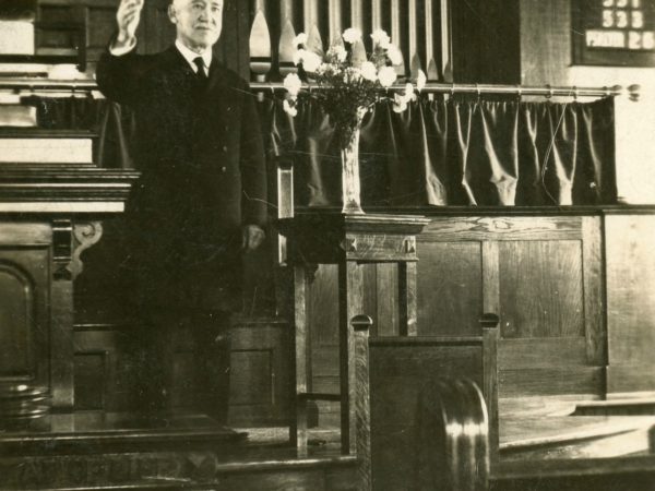 Reverend Ferguson at the front of a church in Hammond