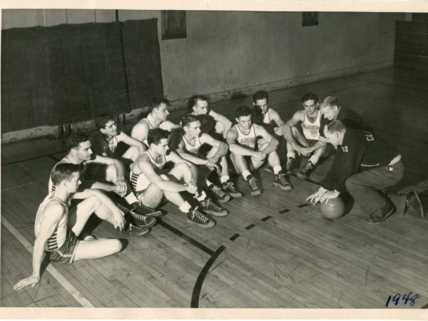 Clarkson basketball team with Coach Hank Hodge in Potsdam